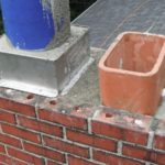 Chimney in middle of restoration process