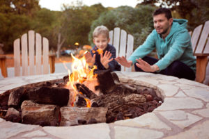 family by a firepit